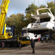 Автокран Liebherr LTM 1200 поднимает катера в яхт-клубе в Москве