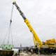 Автокран Liebherr LTM 1500 на разгрузке деталей АЭС в Калининградской области