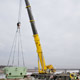 Автокран Liebherr LTM 1500 на разгрузке деталей АЭС в Калининградской области