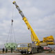 Автокран Liebherr LTM 1500 на разгрузке деталей АЭС в Калининградской области