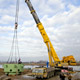 Автокран Liebherr LTM 1500 на разгрузке деталей АЭС в Калининградской области
