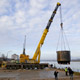 Автокран Liebherr LTM 1500 на разгрузке деталей АЭС в Калининградской области